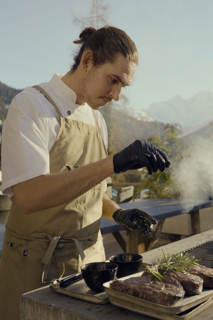 Private chef cooking on the bbq at No. 14 in Verbier