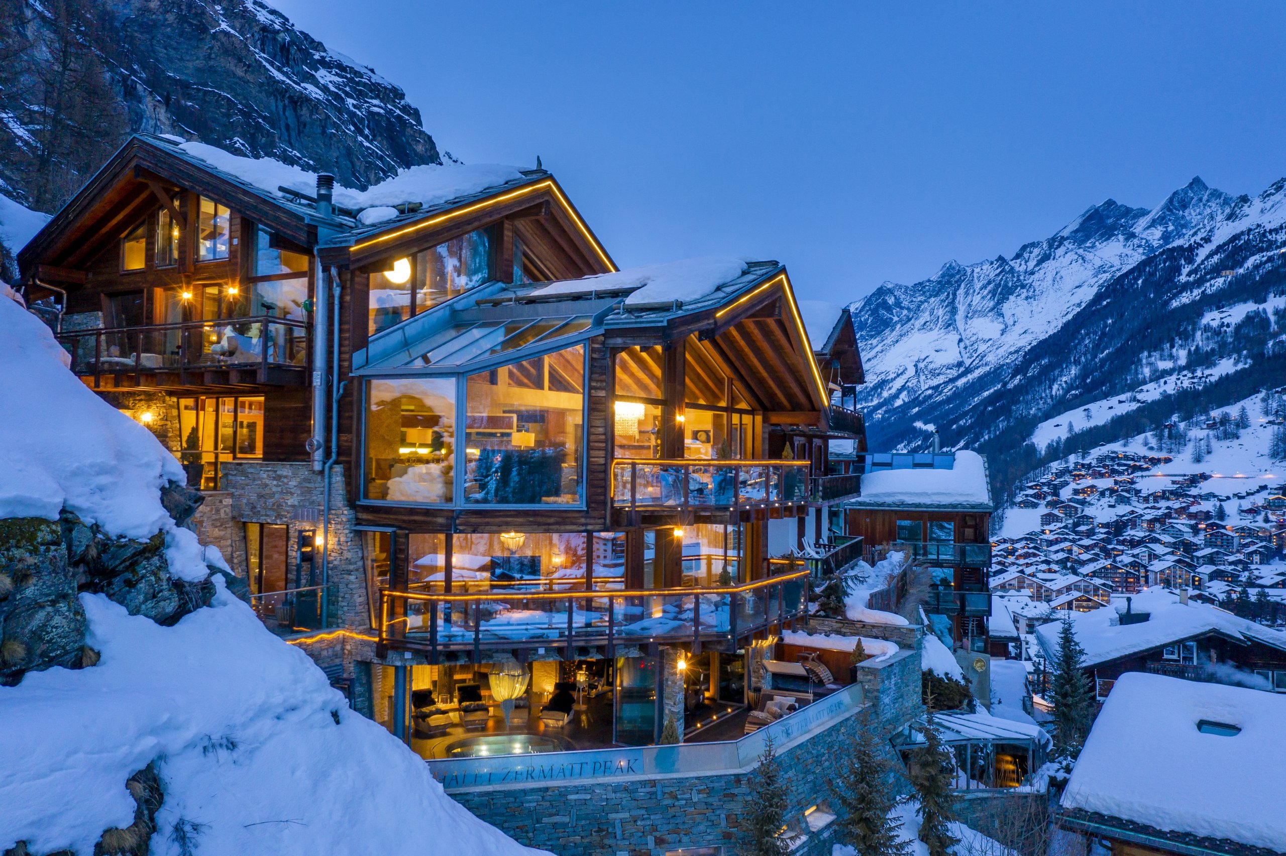 The exterior Chalet Zermatt Peak - built into the mountain. Part of the luxury chalet club collection