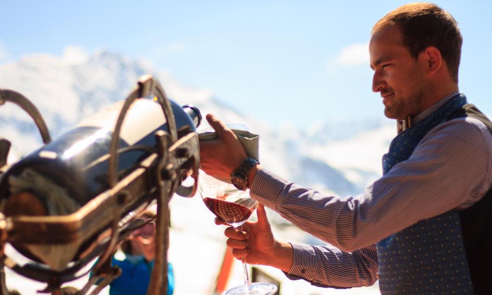 Large bottle of wine being served at the Hospiz Alm in Lech